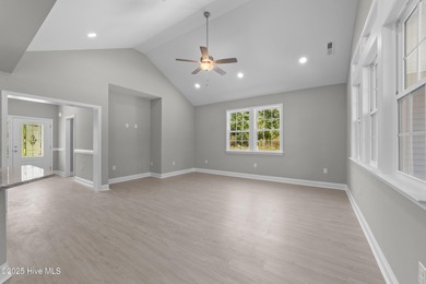 This NEW CONSTRUCTION, single level CRAFTSMAN style home is on Oyster Bay Golf Links in North Carolina - for sale on GolfHomes.com, golf home, golf lot