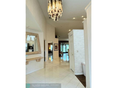 ****  BEAUTIFUL SPACIOUS VILLA OVERLOOKING THE LAKE IN on Gleneagles Golf and Country Club in Florida - for sale on GolfHomes.com, golf home, golf lot