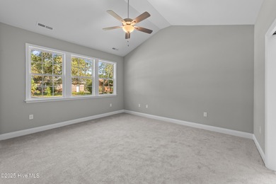 This NEW CONSTRUCTION, single level CRAFTSMAN style home is on Oyster Bay Golf Links in North Carolina - for sale on GolfHomes.com, golf home, golf lot