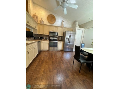 ****  BEAUTIFUL SPACIOUS VILLA OVERLOOKING THE LAKE IN on Gleneagles Golf and Country Club in Florida - for sale on GolfHomes.com, golf home, golf lot