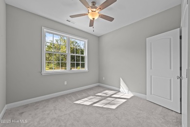 This NEW CONSTRUCTION, single level CRAFTSMAN style home is on Oyster Bay Golf Links in North Carolina - for sale on GolfHomes.com, golf home, golf lot