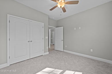 This NEW CONSTRUCTION, single level CRAFTSMAN style home is on Oyster Bay Golf Links in North Carolina - for sale on GolfHomes.com, golf home, golf lot