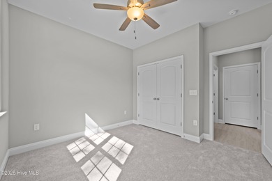 This NEW CONSTRUCTION, single level CRAFTSMAN style home is on Oyster Bay Golf Links in North Carolina - for sale on GolfHomes.com, golf home, golf lot