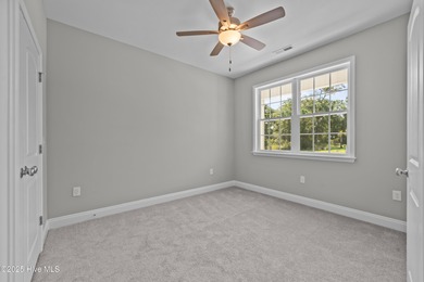 This NEW CONSTRUCTION, single level CRAFTSMAN style home is on Oyster Bay Golf Links in North Carolina - for sale on GolfHomes.com, golf home, golf lot