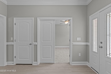 This NEW CONSTRUCTION, single level CRAFTSMAN style home is on Oyster Bay Golf Links in North Carolina - for sale on GolfHomes.com, golf home, golf lot