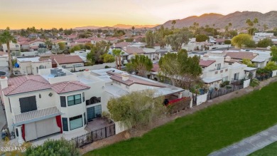 This charming home is perfectly located on the 10th hole of the on Arizona Grand Resort Golf Course in Arizona - for sale on GolfHomes.com, golf home, golf lot