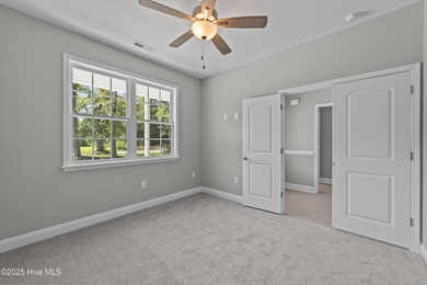 This NEW CONSTRUCTION, single level CRAFTSMAN style home is on Oyster Bay Golf Links in North Carolina - for sale on GolfHomes.com, golf home, golf lot