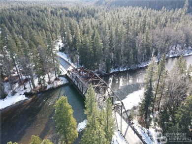 Nestled in the Tumble Creek community, this Swiftwater custom on Suncadia Resort in Washington - for sale on GolfHomes.com, golf home, golf lot