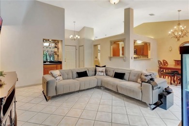 Discover tranquil living in this beautifully maintained on Royal Palm Golf Club in Florida - for sale on GolfHomes.com, golf home, golf lot
