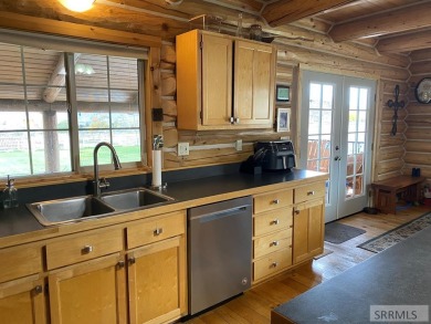 Beautiful custom built log home on approx. 1.2 acres in the on Challis Golf Course in Idaho - for sale on GolfHomes.com, golf home, golf lot