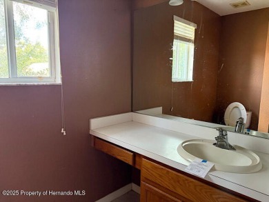 This beautiful 3 bedroom, 2.5 bath home is located in the on Hernando Oaks Golf and Country Club in Florida - for sale on GolfHomes.com, golf home, golf lot