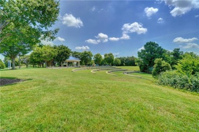 Meticulously maintained 3-bedroom, 2.5-bath condo in The on Riverfront Golf Club in Virginia - for sale on GolfHomes.com, golf home, golf lot