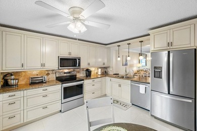 Beautiful 2/2 with golf & waterfront views. Kitchen and both on Indian Spring Golf and Country Club in Florida - for sale on GolfHomes.com, golf home, golf lot