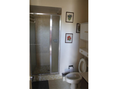 Bring your buyers! This townhouse offers incredible potential on  in Florida - for sale on GolfHomes.com, golf home, golf lot