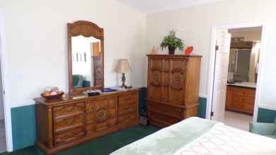 Step into comfort and style with this generously sized 3-bedroom on Schalamar Creek Golf and Country Club in Florida - for sale on GolfHomes.com, golf home, golf lot