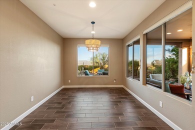 Set on an elevated premium lot capturing sweeping views of Four on Vista Verde Golf Course in Arizona - for sale on GolfHomes.com, golf home, golf lot
