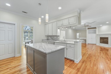 FRESH NEW LOOK on this Lovely Lakefront Home! Custom Brick on Golden Eagle Country Club in Florida - for sale on GolfHomes.com, golf home, golf lot