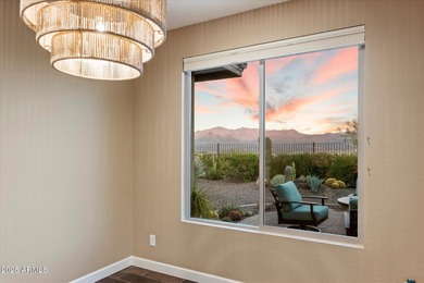 Set on an elevated premium lot capturing sweeping views of Four on Vista Verde Golf Course in Arizona - for sale on GolfHomes.com, golf home, golf lot