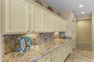 Located on the 14th hole of Deer Valley Golf Course in Sun City on Corte Bella Golf Club in Arizona - for sale on GolfHomes.com, golf home, golf lot