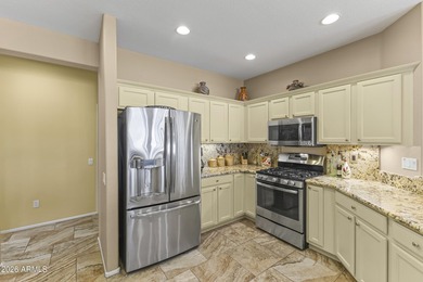 Located on the 14th hole of Deer Valley Golf Course in Sun City on Corte Bella Golf Club in Arizona - for sale on GolfHomes.com, golf home, golf lot