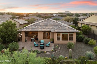 Set on an elevated premium lot capturing sweeping views of Four on Vista Verde Golf Course in Arizona - for sale on GolfHomes.com, golf home, golf lot