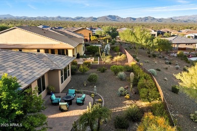 Set on an elevated premium lot capturing sweeping views of Four on Vista Verde Golf Course in Arizona - for sale on GolfHomes.com, golf home, golf lot