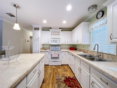 Welcome to Golf Lakes, a sought-after, resident-owned, gated 55+ on Heather Hills Golf Course in Florida - for sale on GolfHomes.com, golf home, golf lot