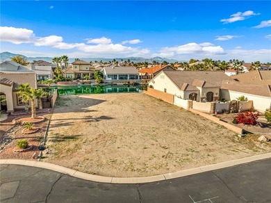 Rare opportunity to own a waterfront vacant lot in the highly on Los Lagos Golf Club in Arizona - for sale on GolfHomes.com, golf home, golf lot