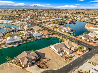 Rare opportunity to own a waterfront vacant lot in the highly on Los Lagos Golf Club in Arizona - for sale on GolfHomes.com, golf home, golf lot