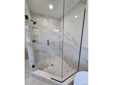 Ready to move in - includes the irrigation system, sod, and on St Clair River Country Club in Michigan - for sale on GolfHomes.com, golf home, golf lot