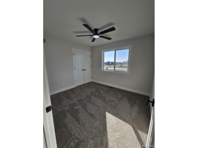 Ready to move in - includes the irrigation system, sod, and on St Clair River Country Club in Michigan - for sale on GolfHomes.com, golf home, golf lot