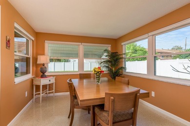 This move-in ready home is perfectly situated between vibrant on The Dunedin Country Club in Florida - for sale on GolfHomes.com, golf home, golf lot