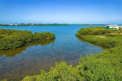 Build your dream home on a spectacular .39 acre waterfront lot on Lemon Bay Golf Club in Florida - for sale on GolfHomes.com, golf home, golf lot