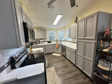The Lot Rent for this home is $1,075.00 monthly.  Wow, Showcase on Del Tura Golf and Country Club in Florida - for sale on GolfHomes.com, golf home, golf lot