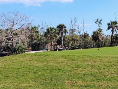 Build your dream home on a spectacular .39 acre waterfront lot on Lemon Bay Golf Club in Florida - for sale on GolfHomes.com, golf home, golf lot