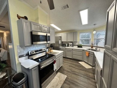 The Lot Rent for this home is $1,075.00 monthly.  Wow, Showcase on Del Tura Golf and Country Club in Florida - for sale on GolfHomes.com, golf home, golf lot