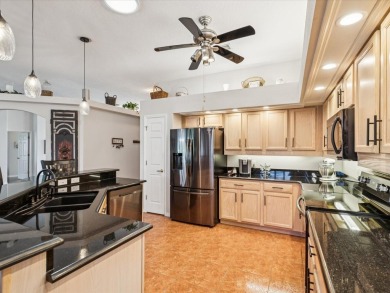 This spacious Grand Cayman model offers over 2,700 Sq Ft of on Heritage Pines Country Club in Florida - for sale on GolfHomes.com, golf home, golf lot