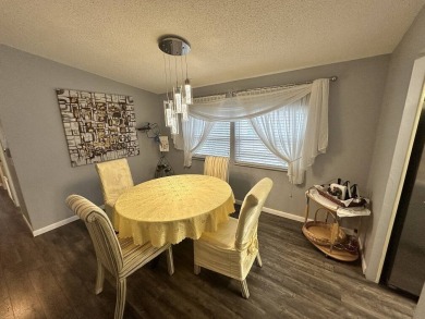 The Lot Rent for this home is $1,075.00 monthly.  Wow, Showcase on Del Tura Golf and Country Club in Florida - for sale on GolfHomes.com, golf home, golf lot