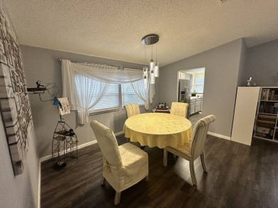 The Lot Rent for this home is $1,075.00 monthly.  Wow, Showcase on Del Tura Golf and Country Club in Florida - for sale on GolfHomes.com, golf home, golf lot