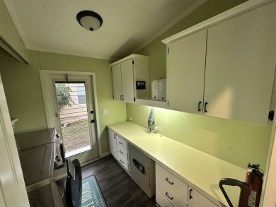 The Lot Rent for this home is $1,075.00 monthly.  Wow, Showcase on Del Tura Golf and Country Club in Florida - for sale on GolfHomes.com, golf home, golf lot