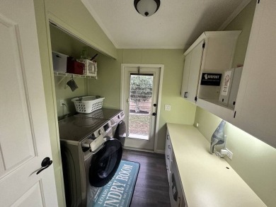 The Lot Rent for this home is $1,075.00 monthly.  Wow, Showcase on Del Tura Golf and Country Club in Florida - for sale on GolfHomes.com, golf home, golf lot