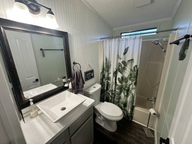 The Lot Rent for this home is $1,075.00 monthly.  Wow, Showcase on Del Tura Golf and Country Club in Florida - for sale on GolfHomes.com, golf home, golf lot
