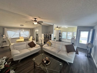 The Lot Rent for this home is $1,075.00 monthly.  Wow, Showcase on Del Tura Golf and Country Club in Florida - for sale on GolfHomes.com, golf home, golf lot