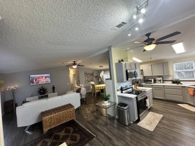 The Lot Rent for this home is $1,075.00 monthly.  Wow, Showcase on Del Tura Golf and Country Club in Florida - for sale on GolfHomes.com, golf home, golf lot