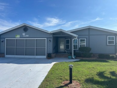 The Lot Rent for this home is $1,075.00 monthly.  Wow, Showcase on Del Tura Golf and Country Club in Florida - for sale on GolfHomes.com, golf home, golf lot