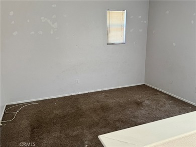 Quaint cul-de-sac street! Two story home with 3 bedrooms and a on Moreno Valley Ranch Golf Club in California - for sale on GolfHomes.com, golf home, golf lot