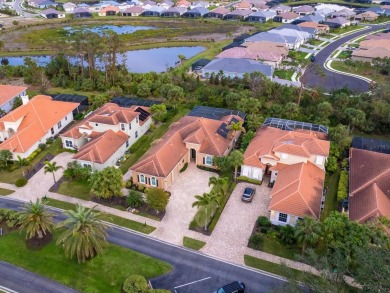 This country club, custom-built home is maintenance-free! Head on Boca Royale Golf and Country Club in Florida - for sale on GolfHomes.com, golf home, golf lot