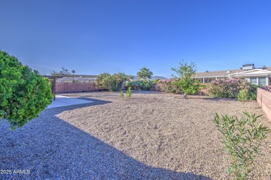 What a bright, cheery deceptively large home in beautiful Sun on Sun City Country Club in Arizona - for sale on GolfHomes.com, golf home, golf lot