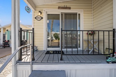 Welcome Home!! This cozy 2-bedroom, 1-bathroom home is nestled on Polo Park East in Florida - for sale on GolfHomes.com, golf home, golf lot