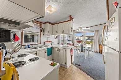 Welcome Home!! This cozy 2-bedroom, 1-bathroom home is nestled on Polo Park East in Florida - for sale on GolfHomes.com, golf home, golf lot